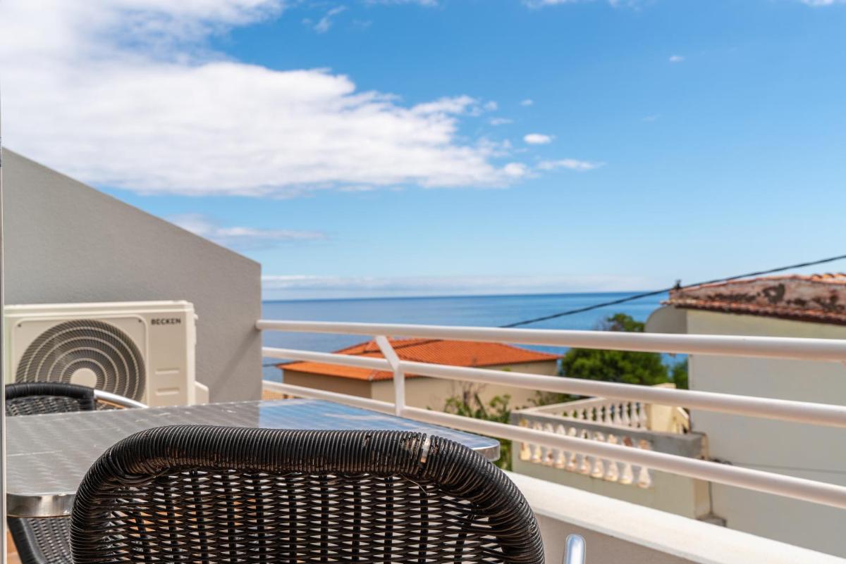 Uma varanda ou terraço em TarmarPlace