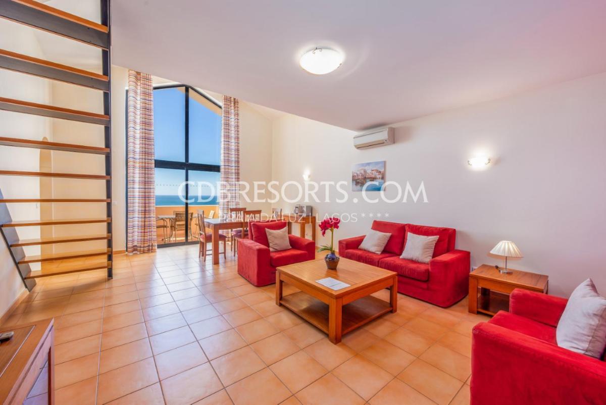 Uma área de estar em Estrela da Luz Resort