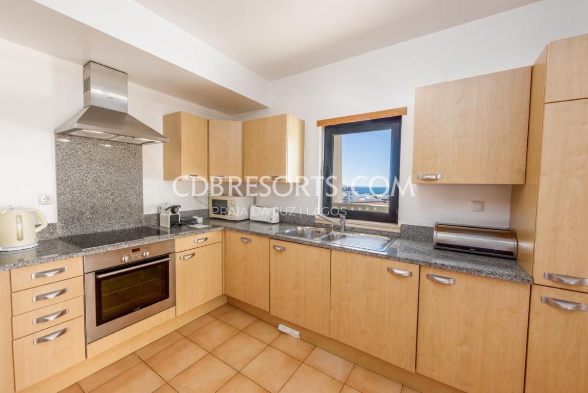 A cozinha ou kitchenette de Estrela da Luz Resort