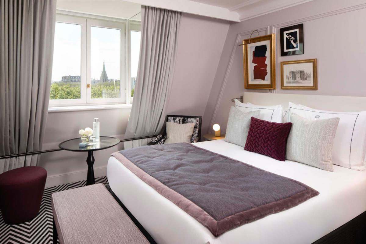 Un ou plusieurs lits dans un hébergement de l'établissement Le Damantin Hôtel & Spa
