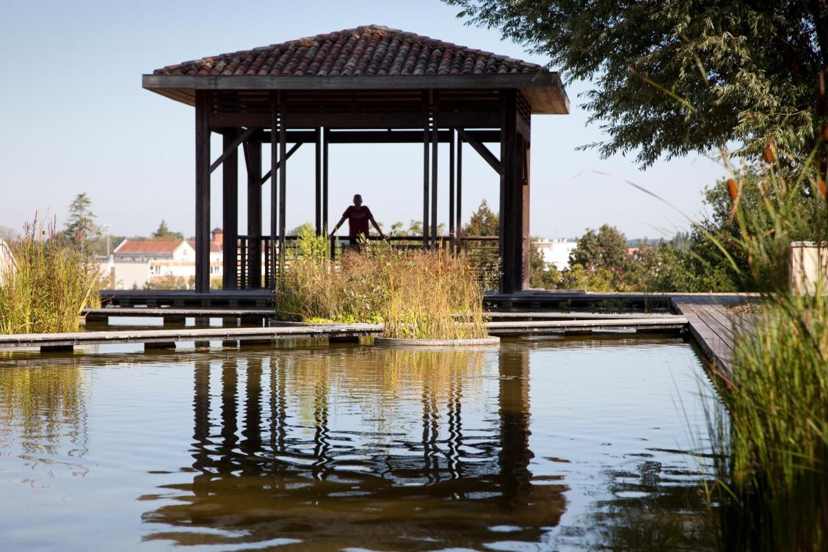 Vue sur la rivière ou le fleuve situé(e) à proximité de l'appart'hôtel