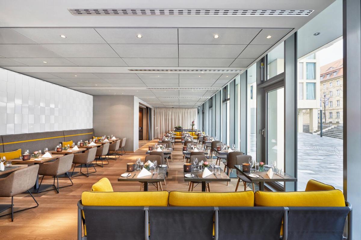 Ein Sitzbereich in der Unterkunft HYPERION Hotel Leipzig Ein Sitzbereich in der Unterkunft HYPERION Hotel Leipzig