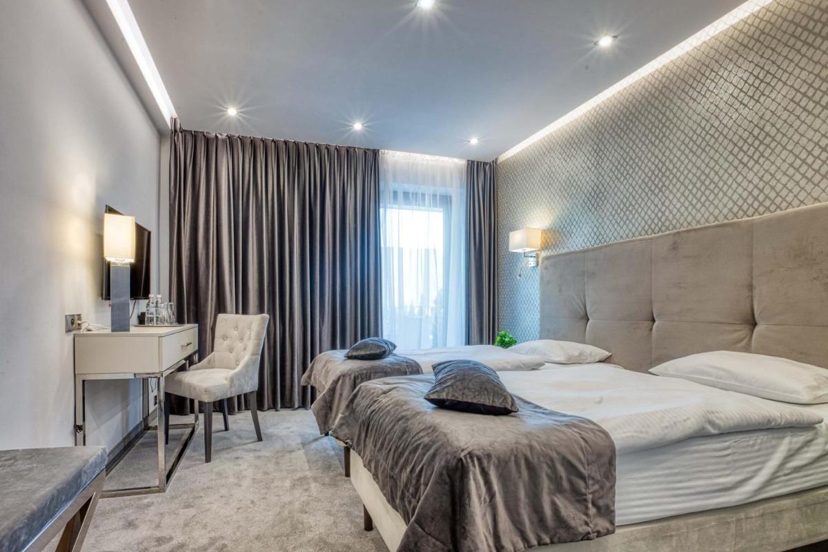 Hotel Biały Dom - Housity