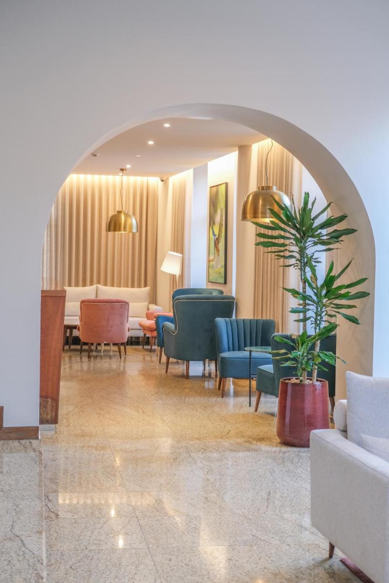 Uma área de estar em Hotel Vouga