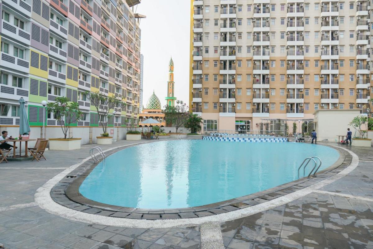 Cozy Studio Apartment at Margonda Residence 2 near Universitas Indonesia By Travelio - Housity