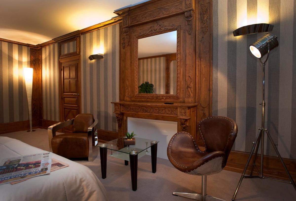 Coin salon dans l'établissement Le Château D'orfeuillette