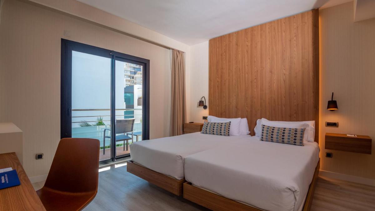 Cama o camas de una habitación en Isla Mallorca & Spa
