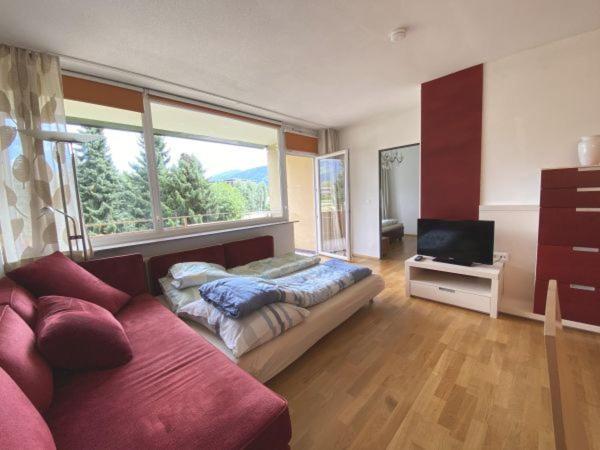 Seeappartment Regina Bodensdorf am Ossiacher See am Fuße der Gerlitzen - Housity