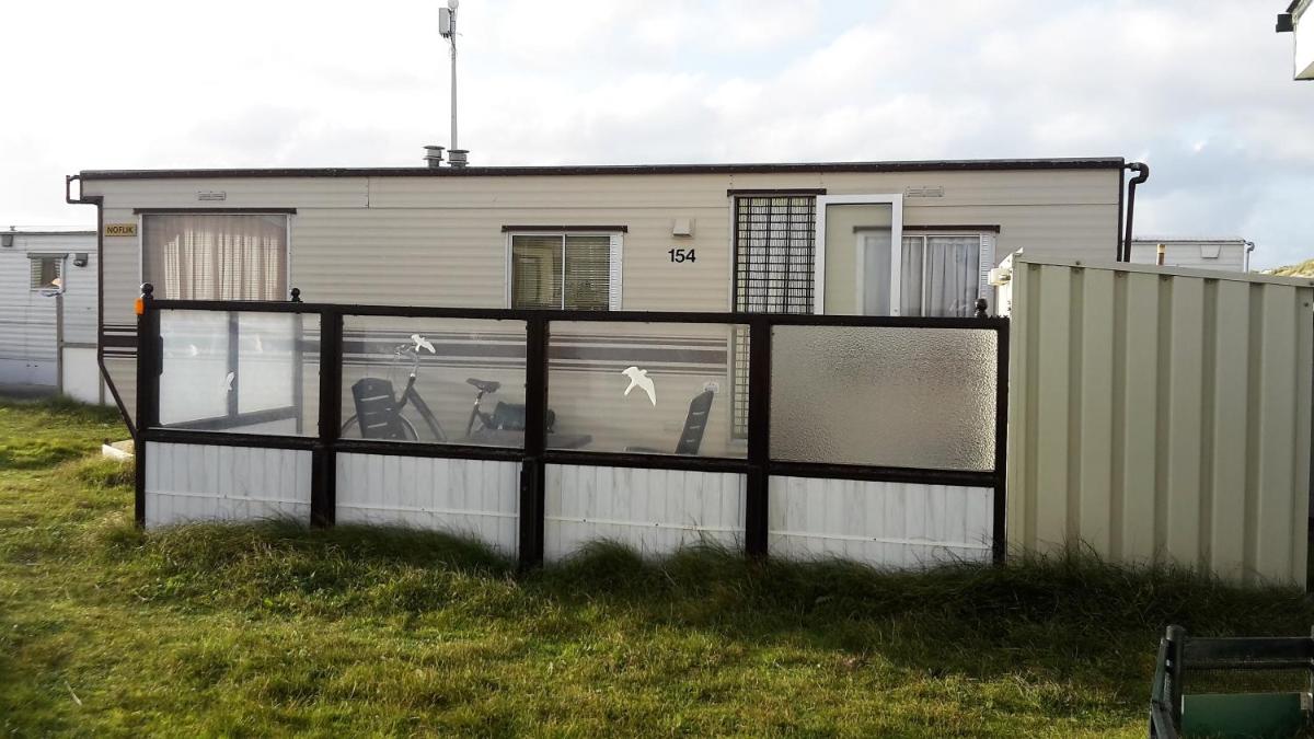 AMELAND-Nes-Duinoord: Stacaravan (chalet) + fietsen direct aan zee! - Housity