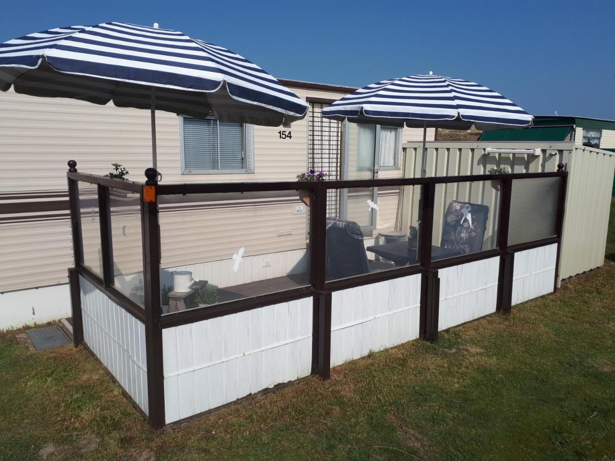 AMELAND-Nes-Duinoord: Stacaravan (chalet) + fietsen direct aan zee! - Housity