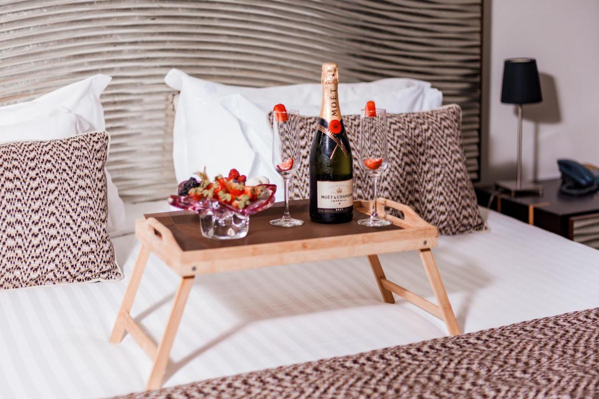 Uma cama ou camas num quarto em Penafiel Park Hotel & Spa