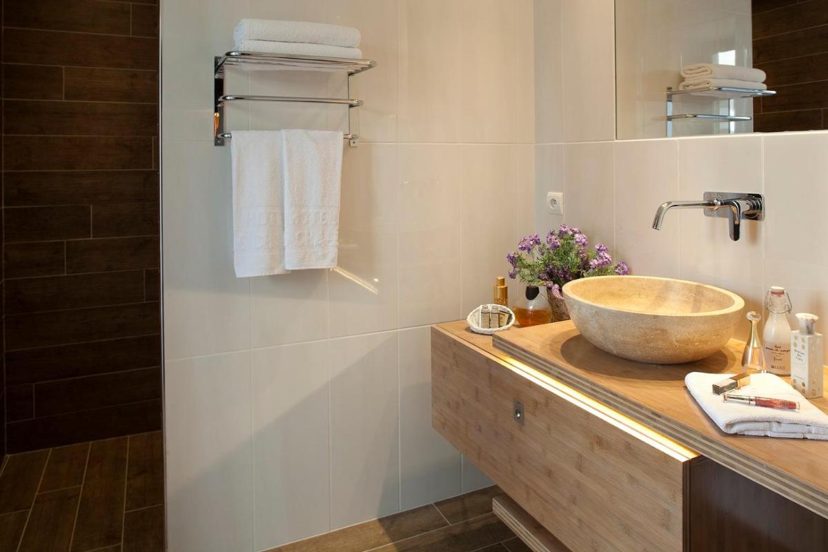 Salle de bains dans l'établissement Hotel le Chalet