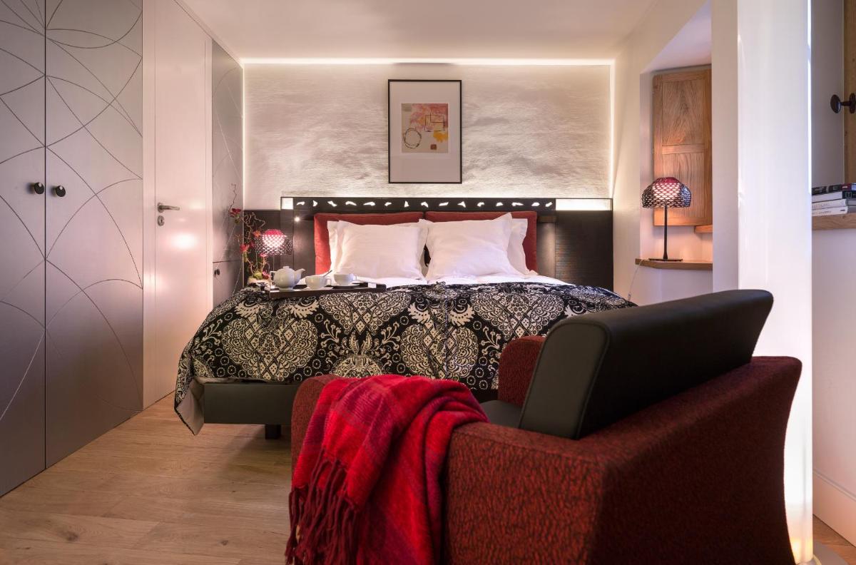 Un ou plusieurs lits dans un hébergement de l'établissement Les Loges Annecy Vieille Ville