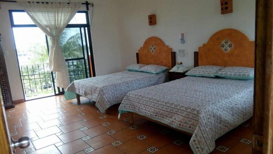 Hotel Villa Palmeras - Housity