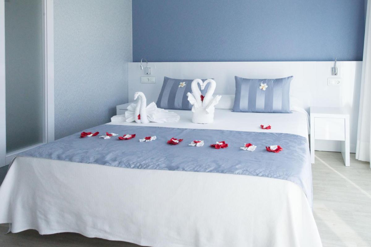 Cama o camas de una habitación en Masd Mediterraneo Hotel Apartamentos Spa