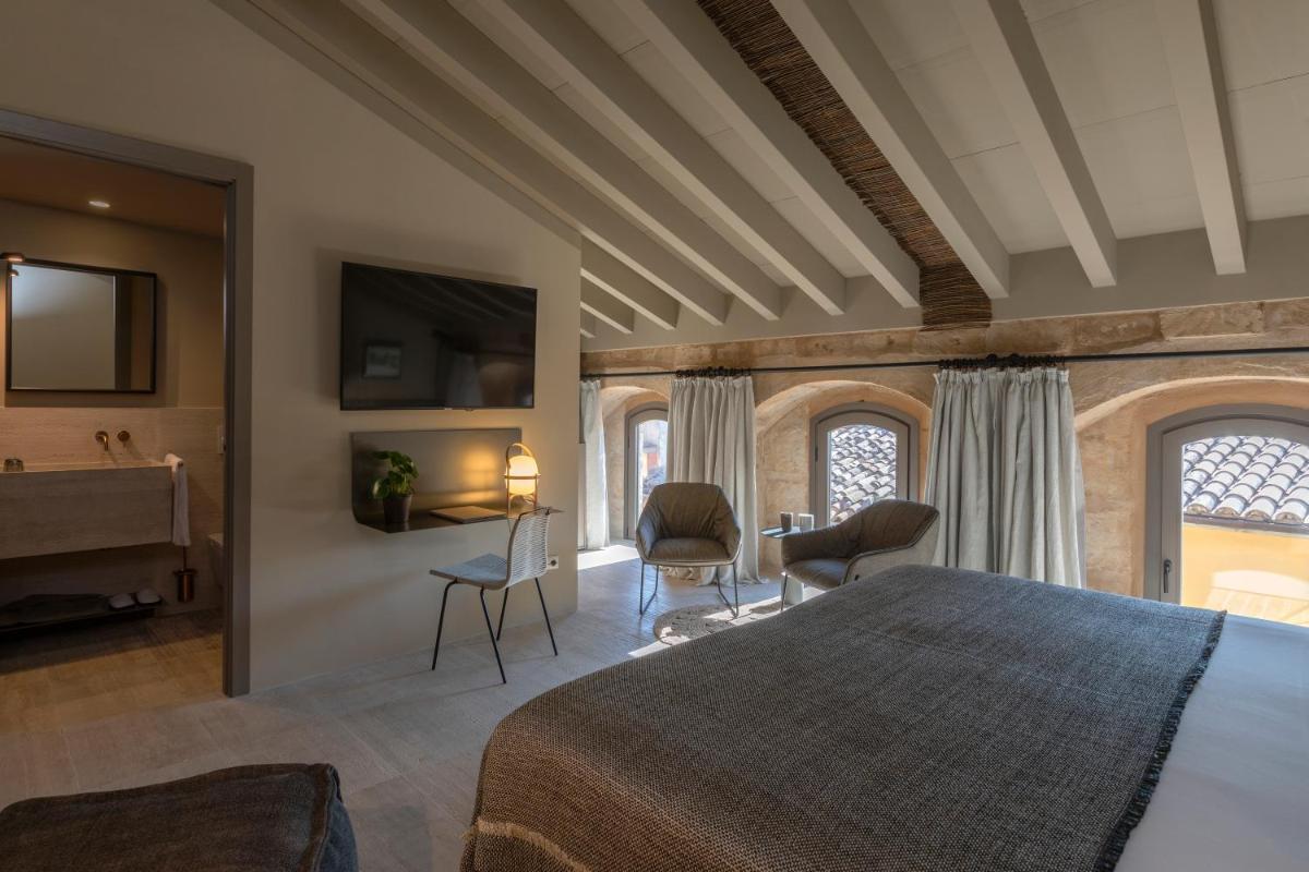 Cama o camas de una habitación en Can Aulí Luxury Retreat - Adults Only