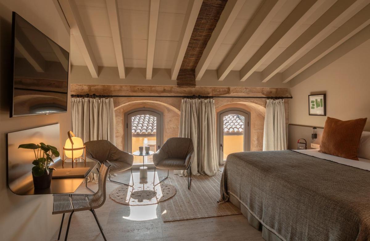 Cama o camas de una habitación en Can Aulí Luxury Retreat - Adults Only