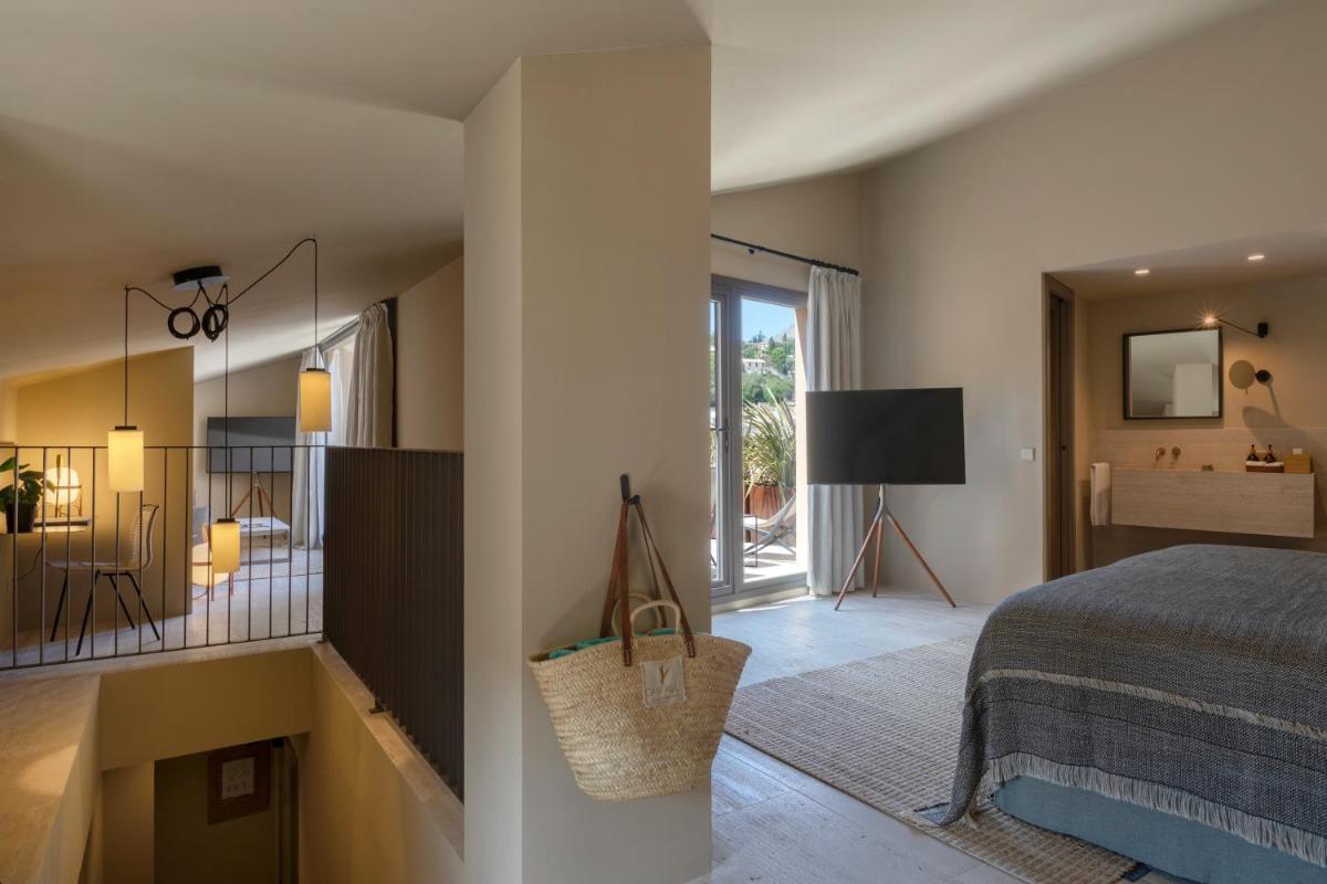 Cama o camas de una habitación en Can Aulí Luxury Retreat - Adults Only