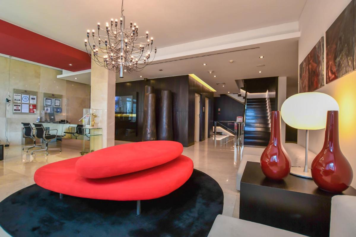 Uma área de estar em Quinta Mirabela - Design Hotel