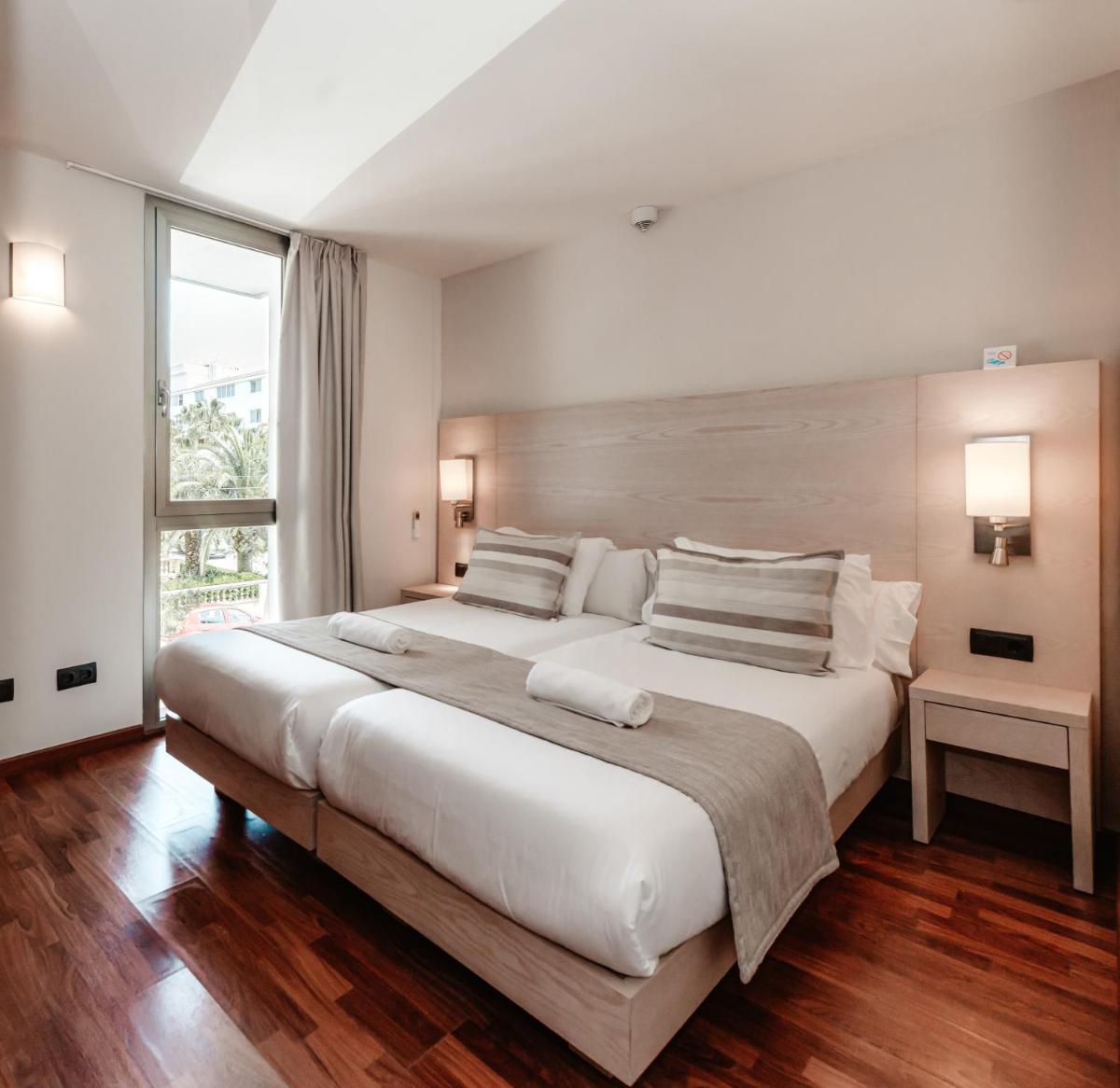 Cama o camas de una habitación en Marins Playa
