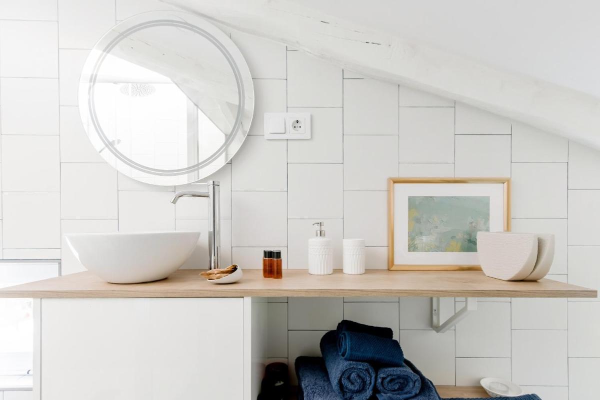 Experience Madrid from Elegant Penthouse Hideaway - Housity