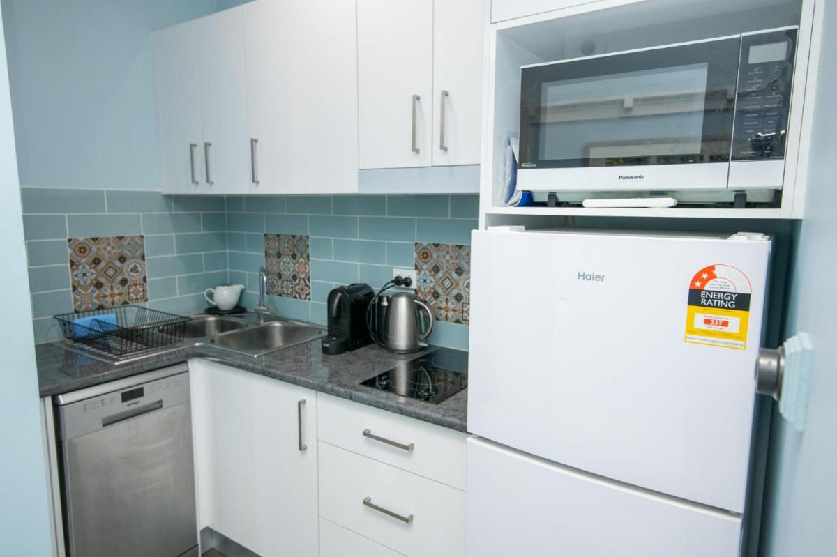 Blue Door Apartments Heritage Charm in CBD - Housity
