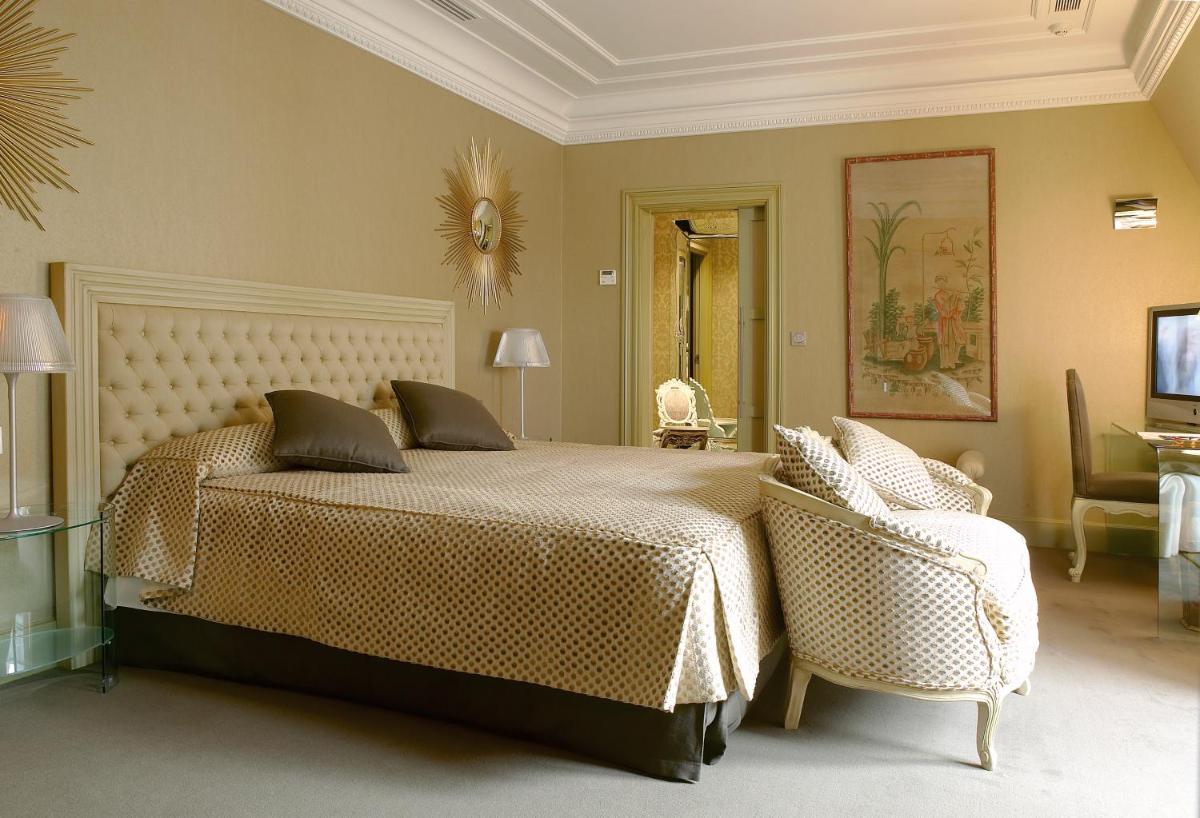 Cama o camas de una habitación en Hotel Carlton