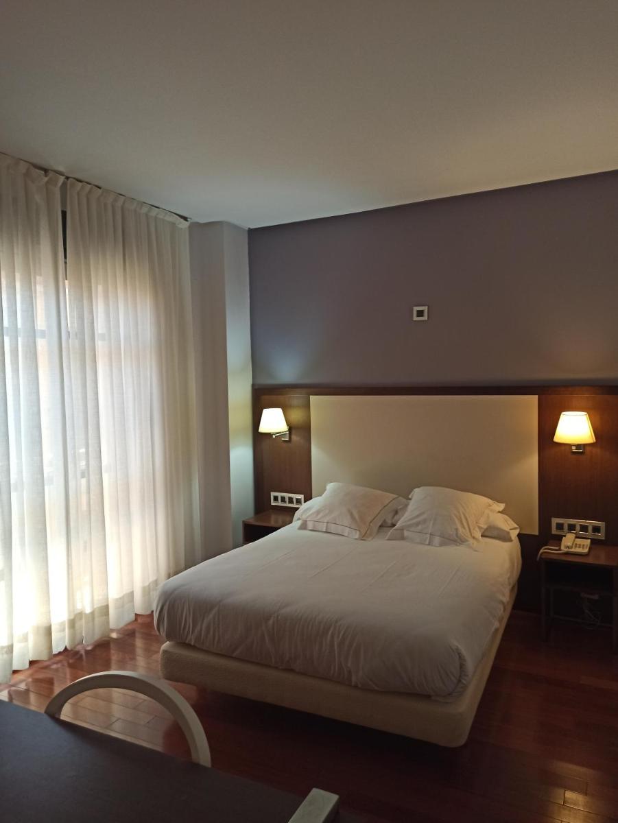 Cama o camas de una habitación en ARVA Spa París