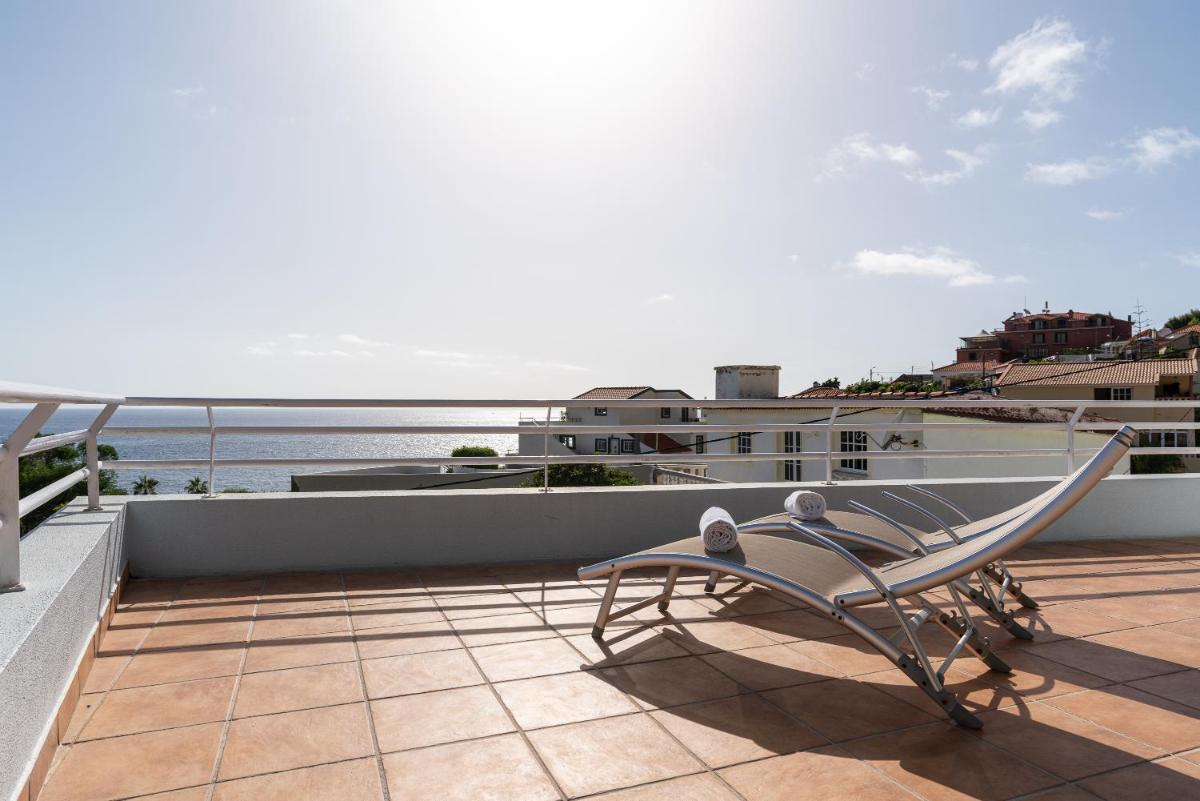 Uma varanda ou terraço em TarmarPlace