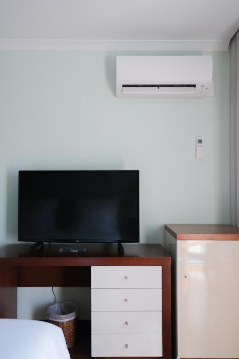 Uma televisão e/ou sistema de entretenimento em Hotel Vouga