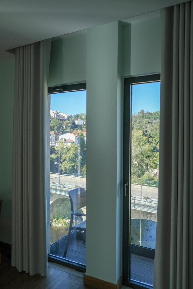 Uma varanda ou terraço em Hotel Vouga