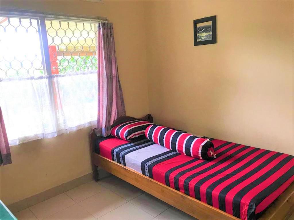Poetri Guest House Syariah near Kebun Raya Bogor - Housity
