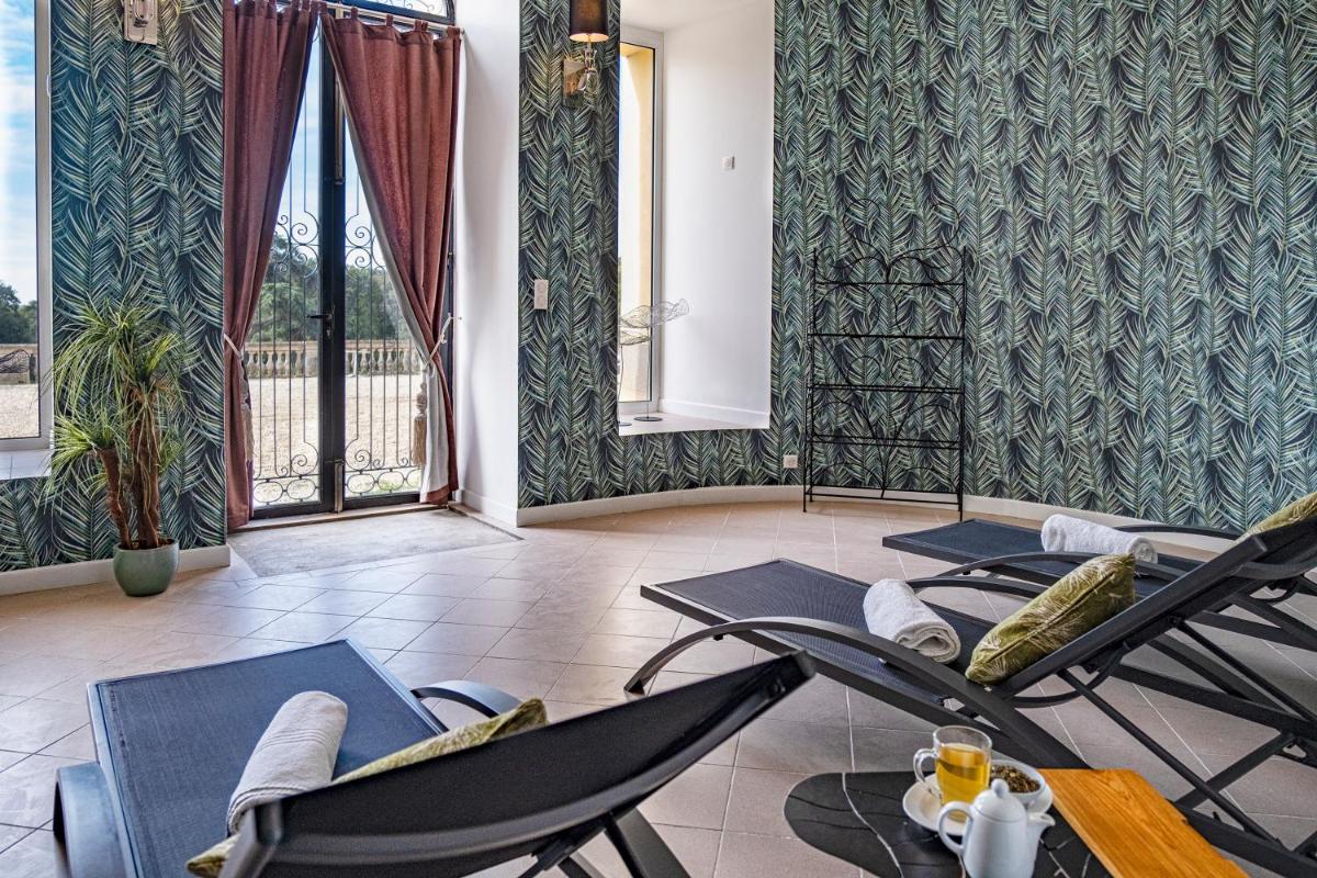 Coin salon dans l'établissement Château de Tressé