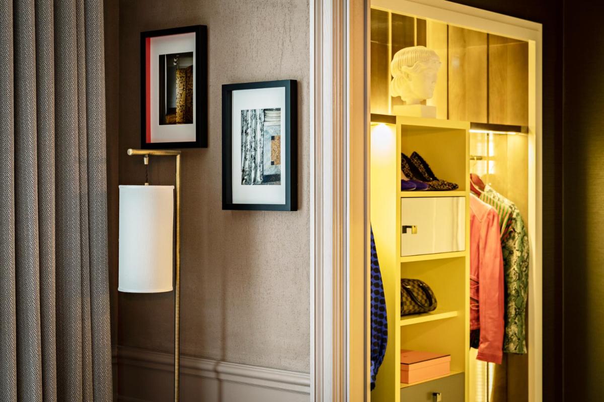Un ou plusieurs lits dans un hébergement de l'établissement Sofitel Le Scribe Paris Opera