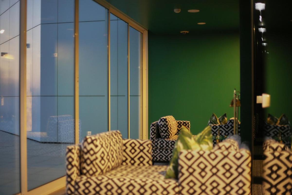 Uma área de estar em Aurea Fatima Hotel Congress & Spa