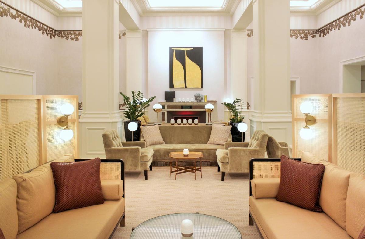 Coin salon dans l'établissement Sofitel Le Scribe Paris Opera