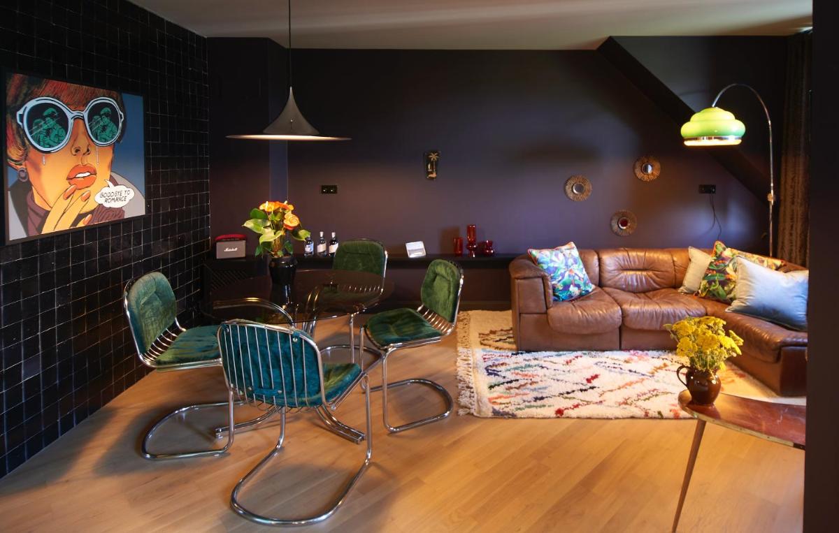 Ein Sitzbereich in der Unterkunft Cora Apartments