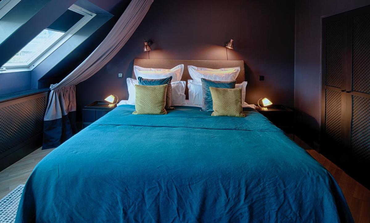 Ein Bett oder Betten in einem Zimmer der Unterkunft Cora Apartments