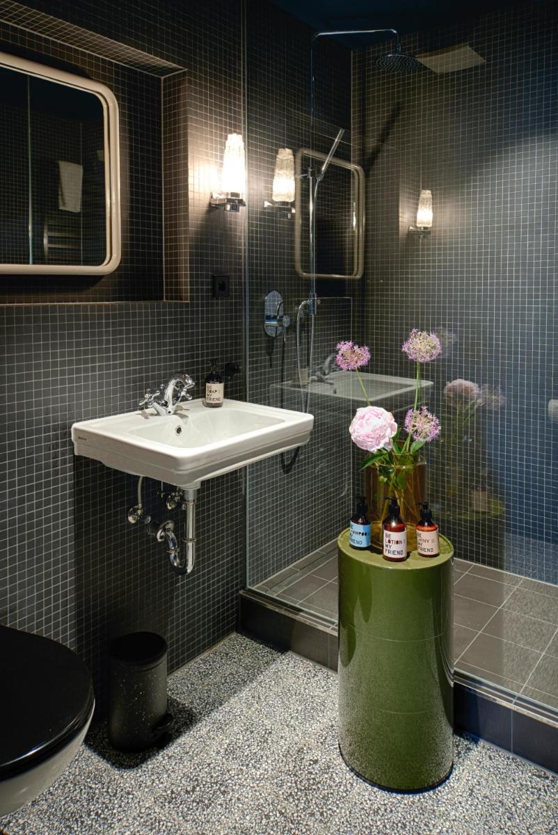 Ein Badezimmer in der Unterkunft Cora Apartments