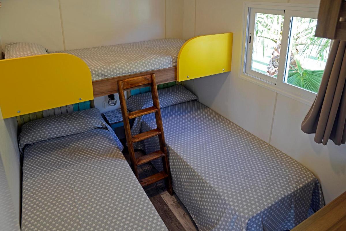 Cama o camas de una habitación en Alannia Costa Blanca