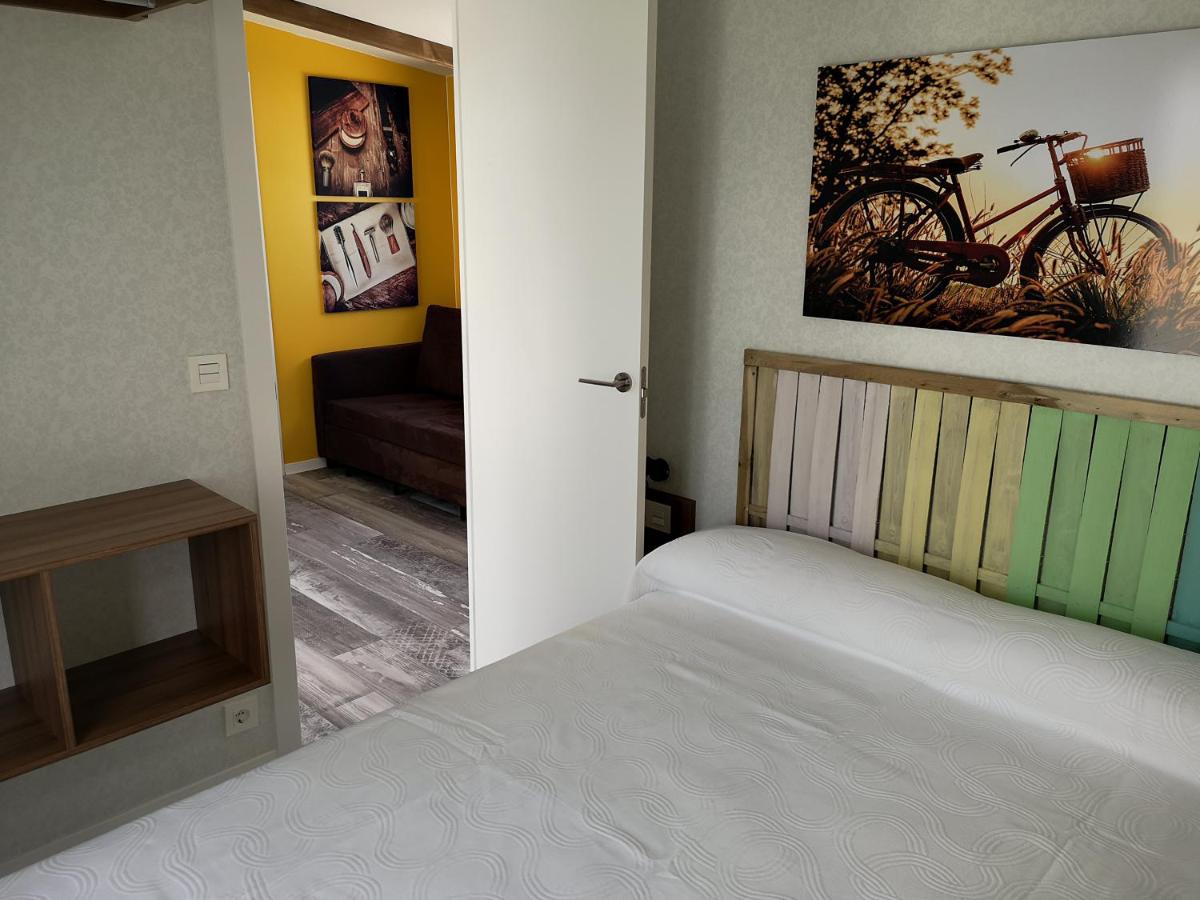 Cama o camas de una habitación en Alannia Costa Blanca