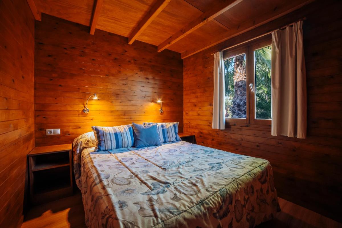 Cama o camas de una habitación en Alannia Costa Blanca