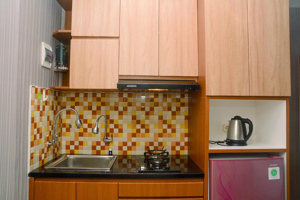 Comfortable Studio Grand Kamala Lagoon Apartment By Travelio - Housity