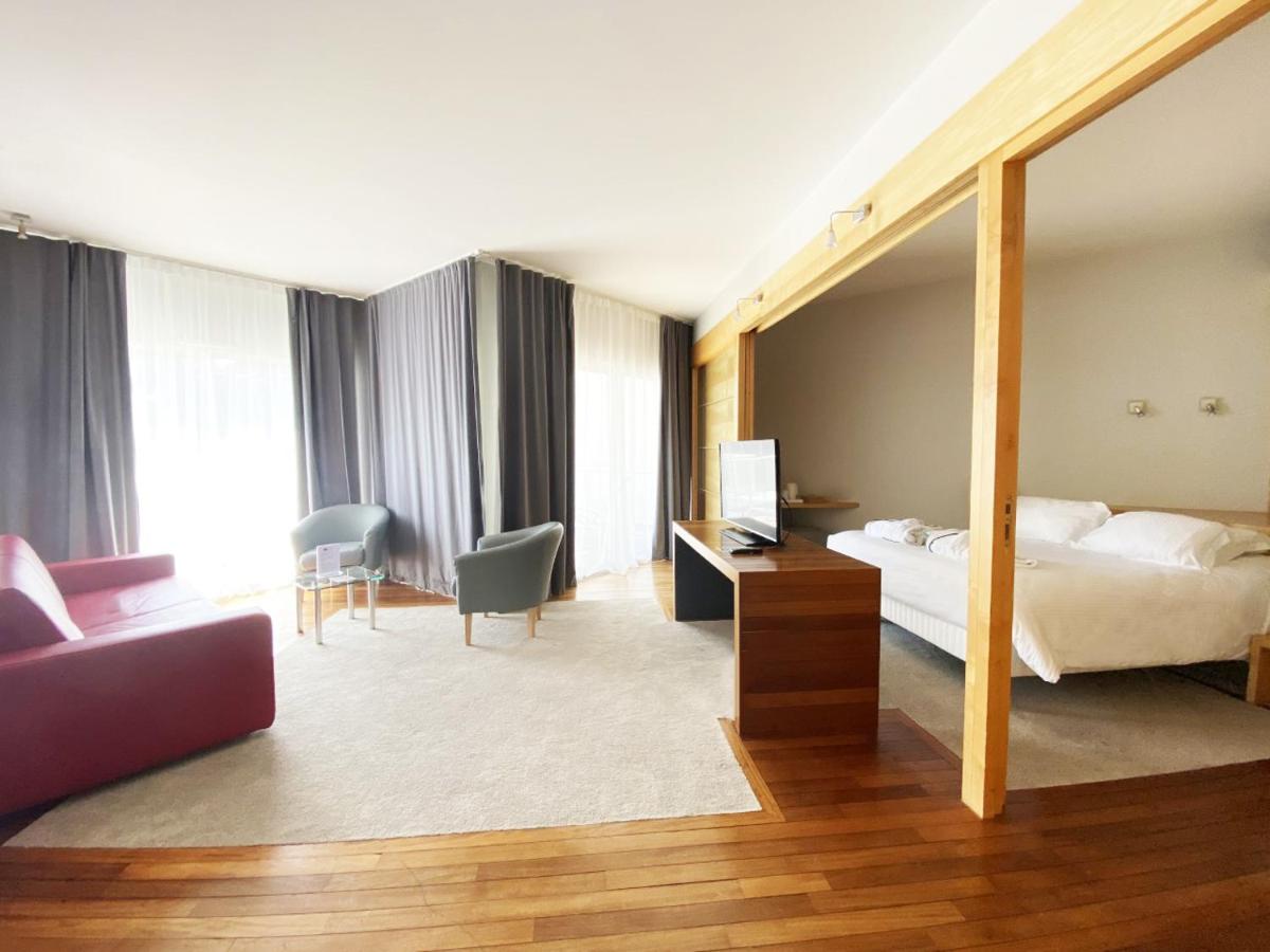 Un ou plusieurs lits dans un hébergement de l'établissement Alliance Pornic Hôtel Thalasso & Spa