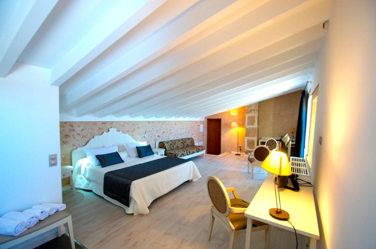 Cama o camas de una habitación en Bennoc Petit Hotel - Only Adults