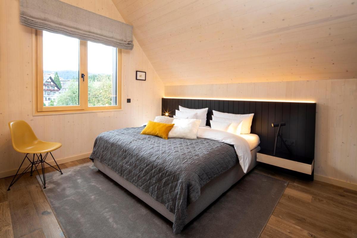 Ein Bett oder Betten in einem Zimmer der Unterkunft Wellness & Genuss Resort - Engel Obertal