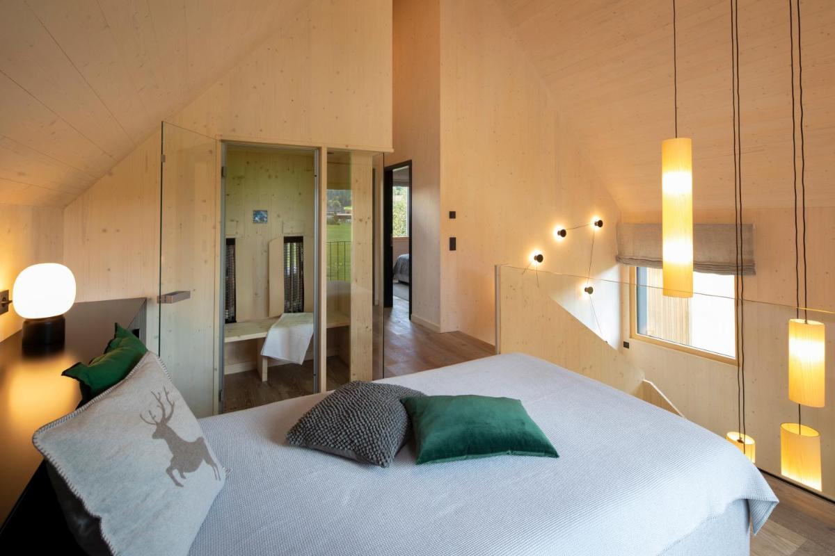 Ein Bett oder Betten in einem Zimmer der Unterkunft Wellness & Genuss Resort - Engel Obertal