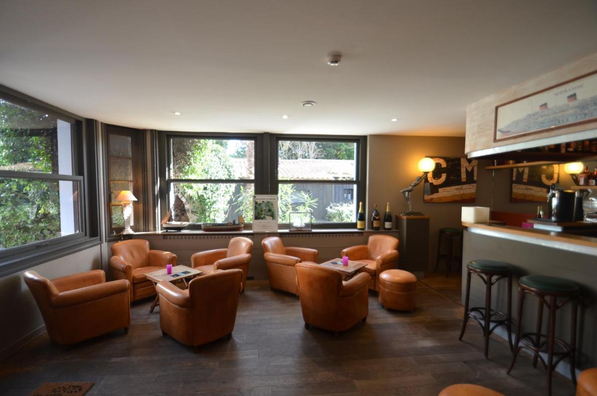 Coin salon dans l'établissement Hotel L'Océan