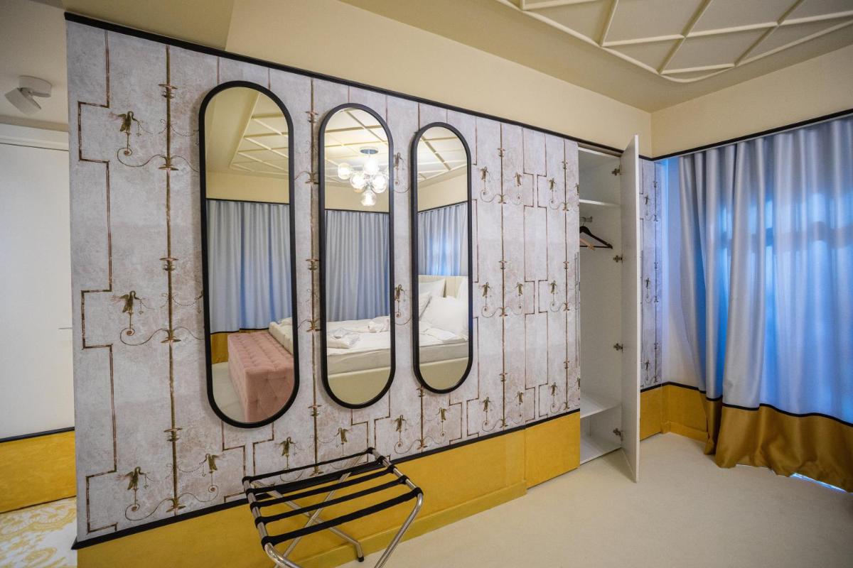 Epoca Central Boutique - Housity