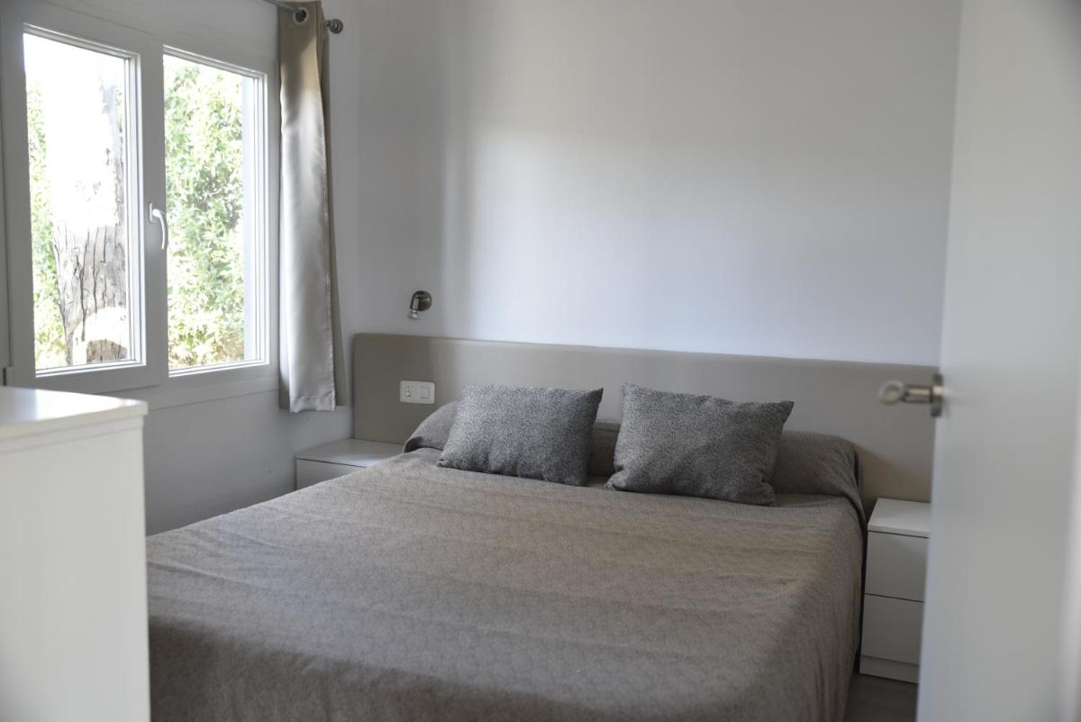 Cama o camas de una habitación en Alannia Guardamar